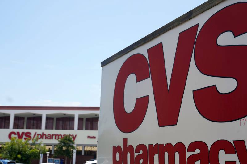 FILE - A sign marks a CVS branch on Tuesday, May 16, 2023, in Pasadena, Calif.  CVS Health is...