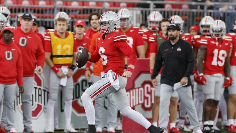 Ohio State quarterback Kyle McCord plays against Maryland during an NCAA college football game...