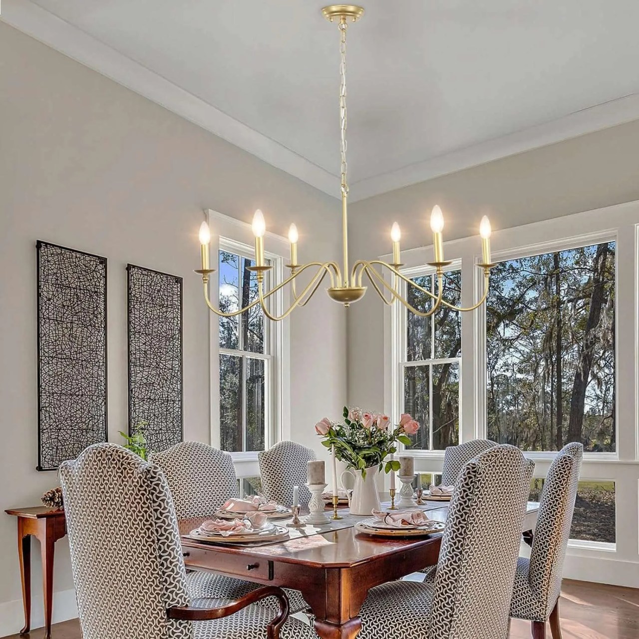 gold chandelier over a dining table