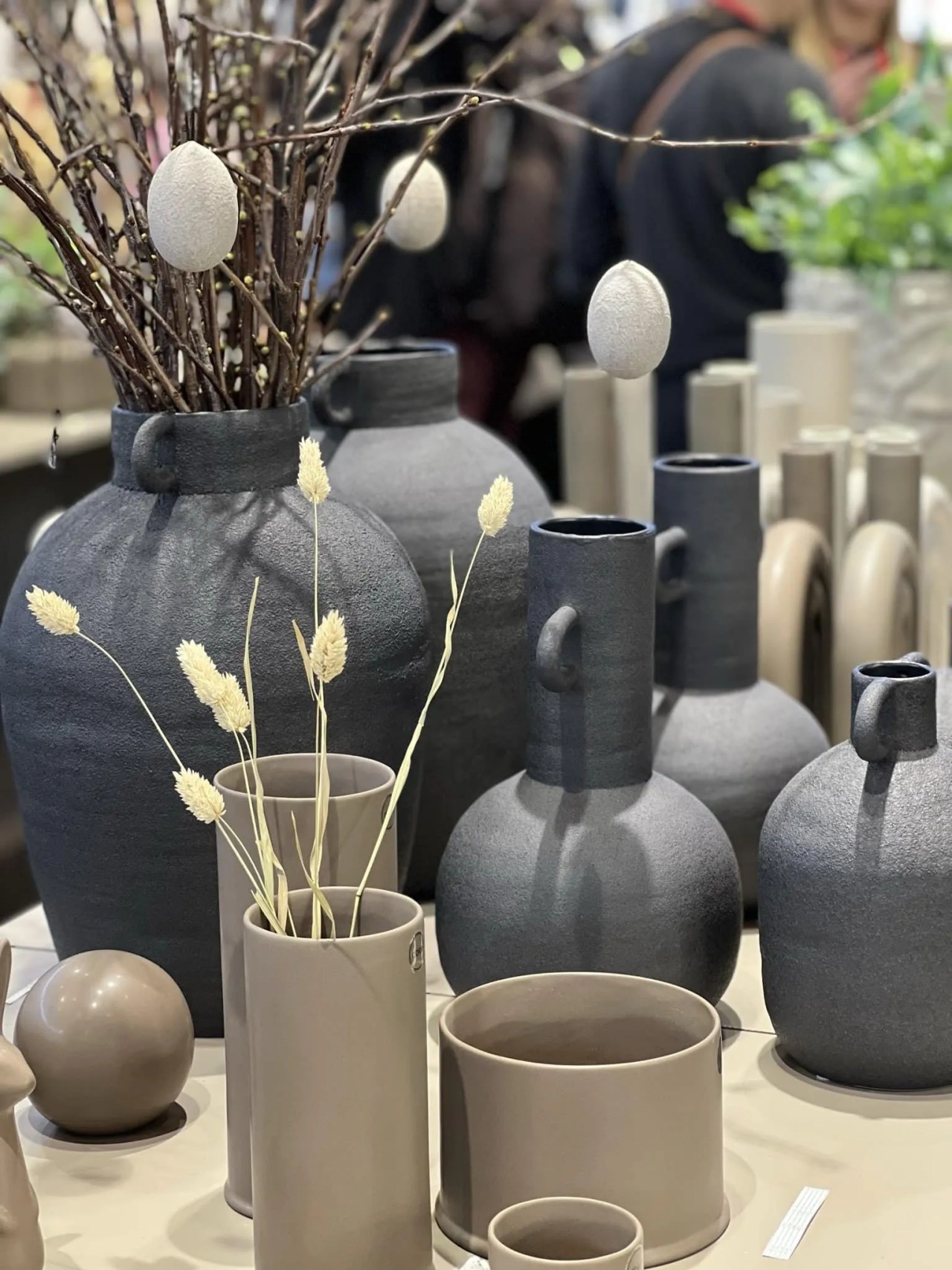 neutral and black ceramic vases