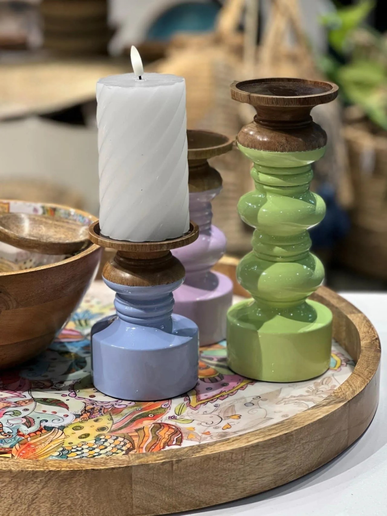 candles and colourful candlestick holders