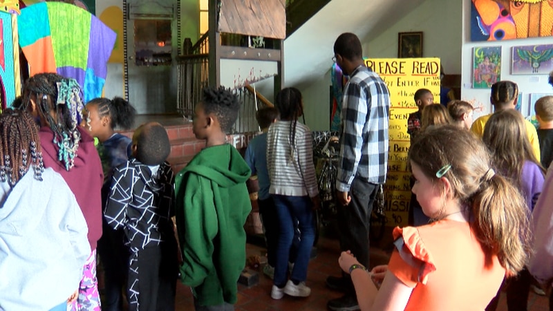 Children from The Wade Center get a tour of the haunted house at The Ramsey School.