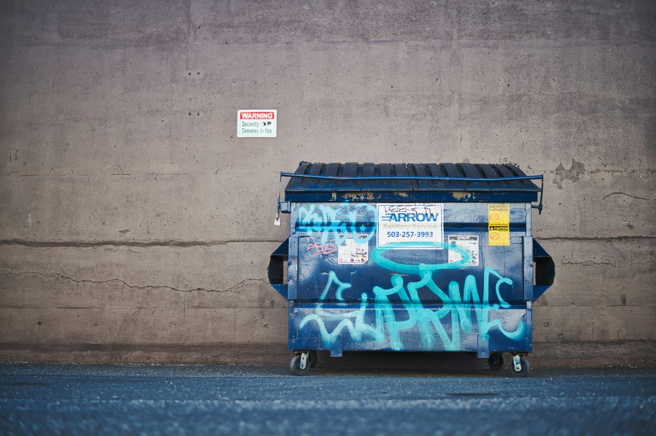 a dumpster on a road