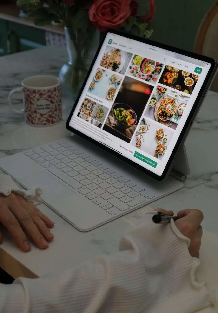 woman looking at pictures of dishes on a tablet