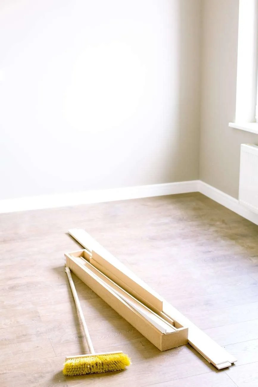 wood planks and floor brush