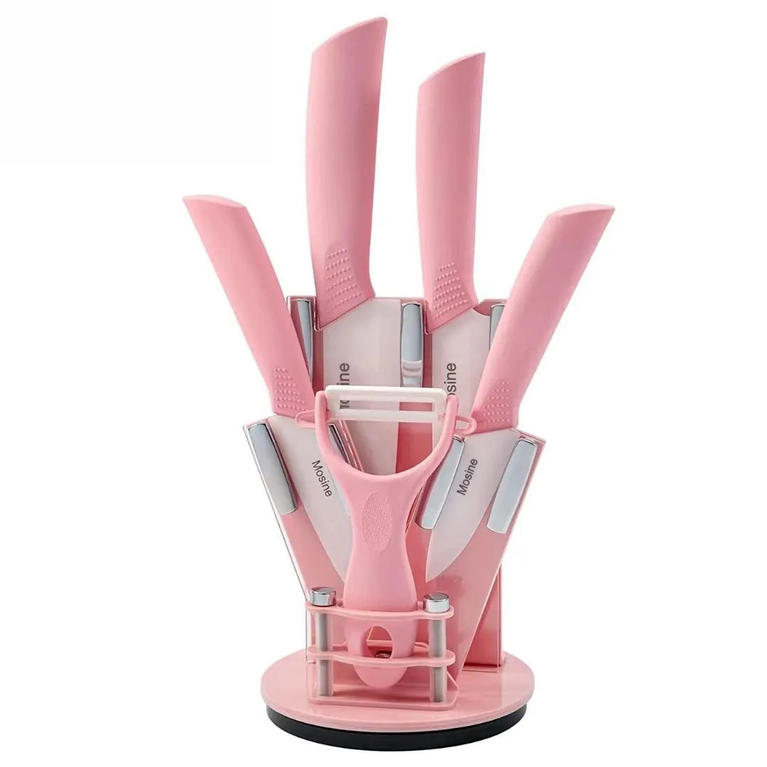 pink knife handles x 6 in a pink knife block with pink potato peeler