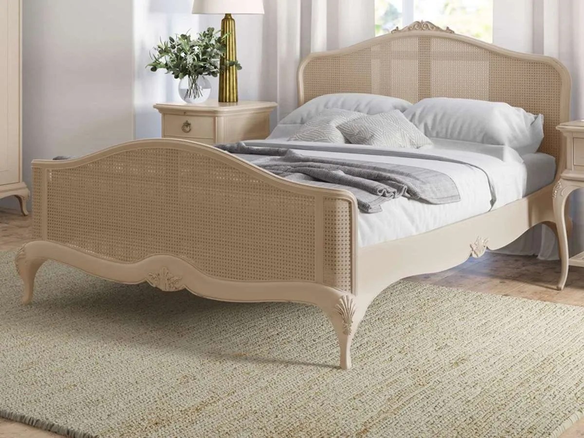 a rattan bed in a neutral bedroom