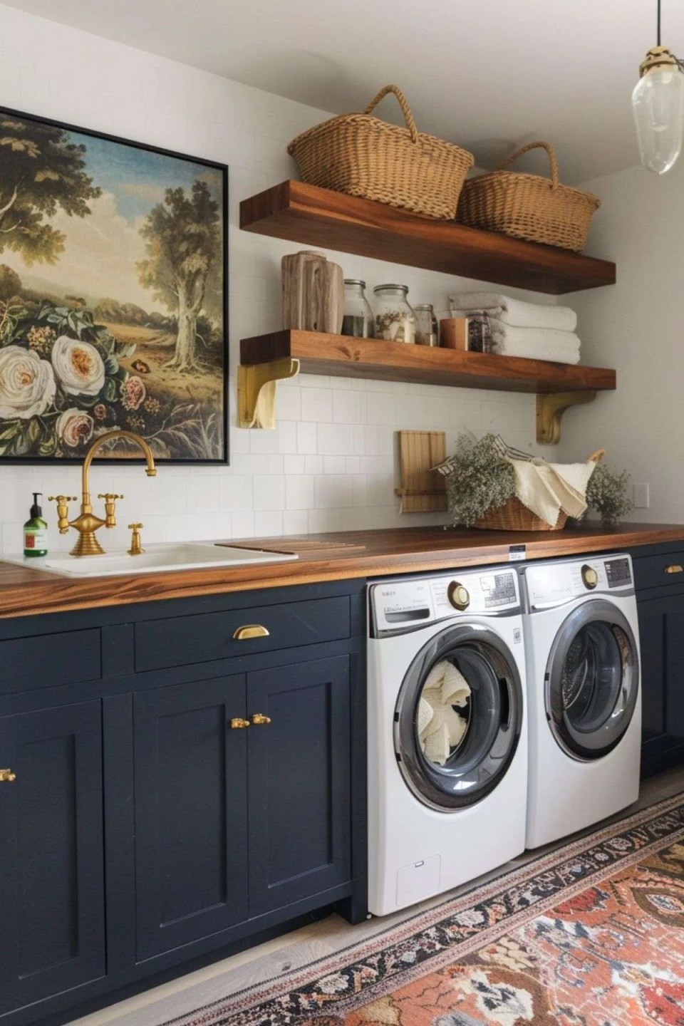 a laundry room with dark cabinets, shelvings and vintage artwork