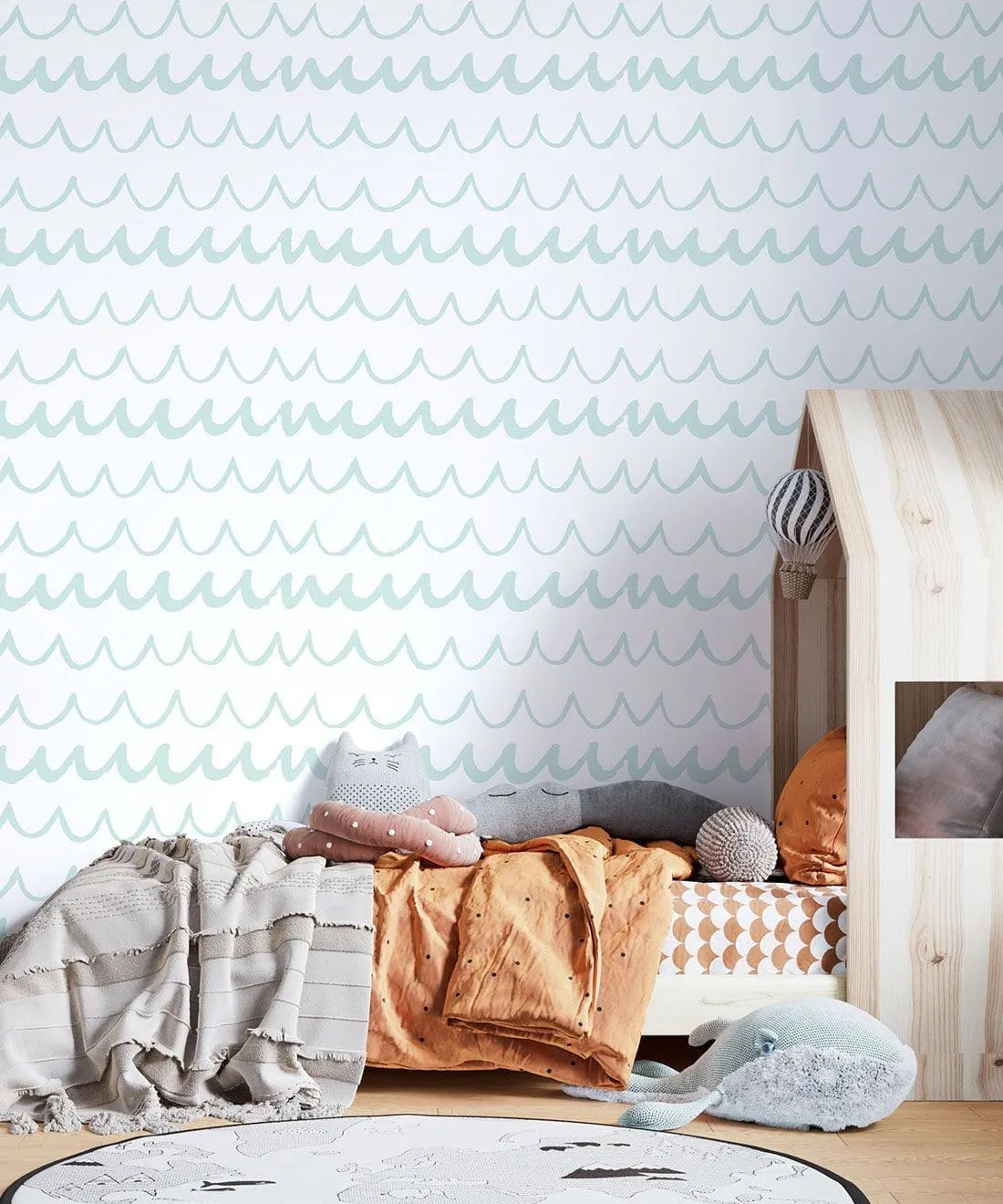 light blue wave patterns on a wallpaper in a boys room